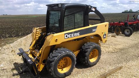 john deere skid steer tires|jd 320 skid steer.